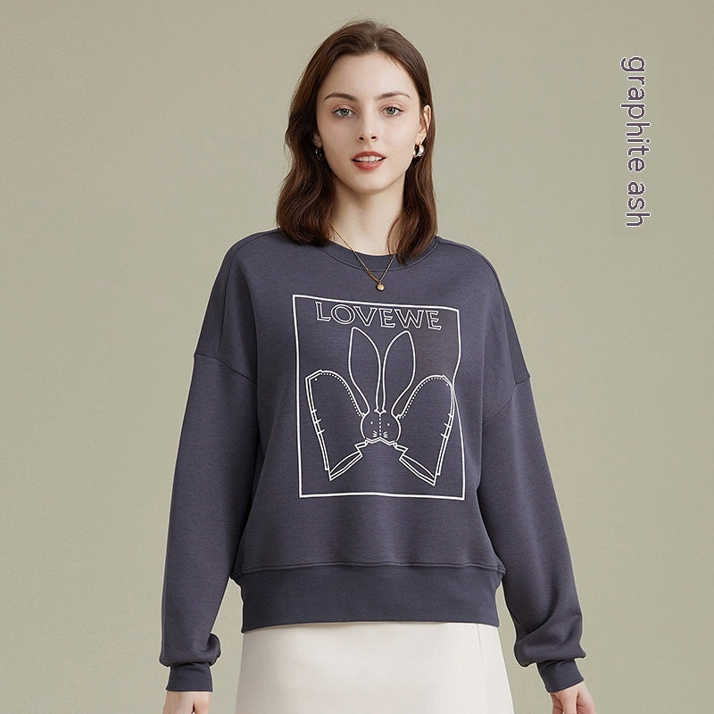 Camiseta de manga larga holgada con estampado de moda para mujer